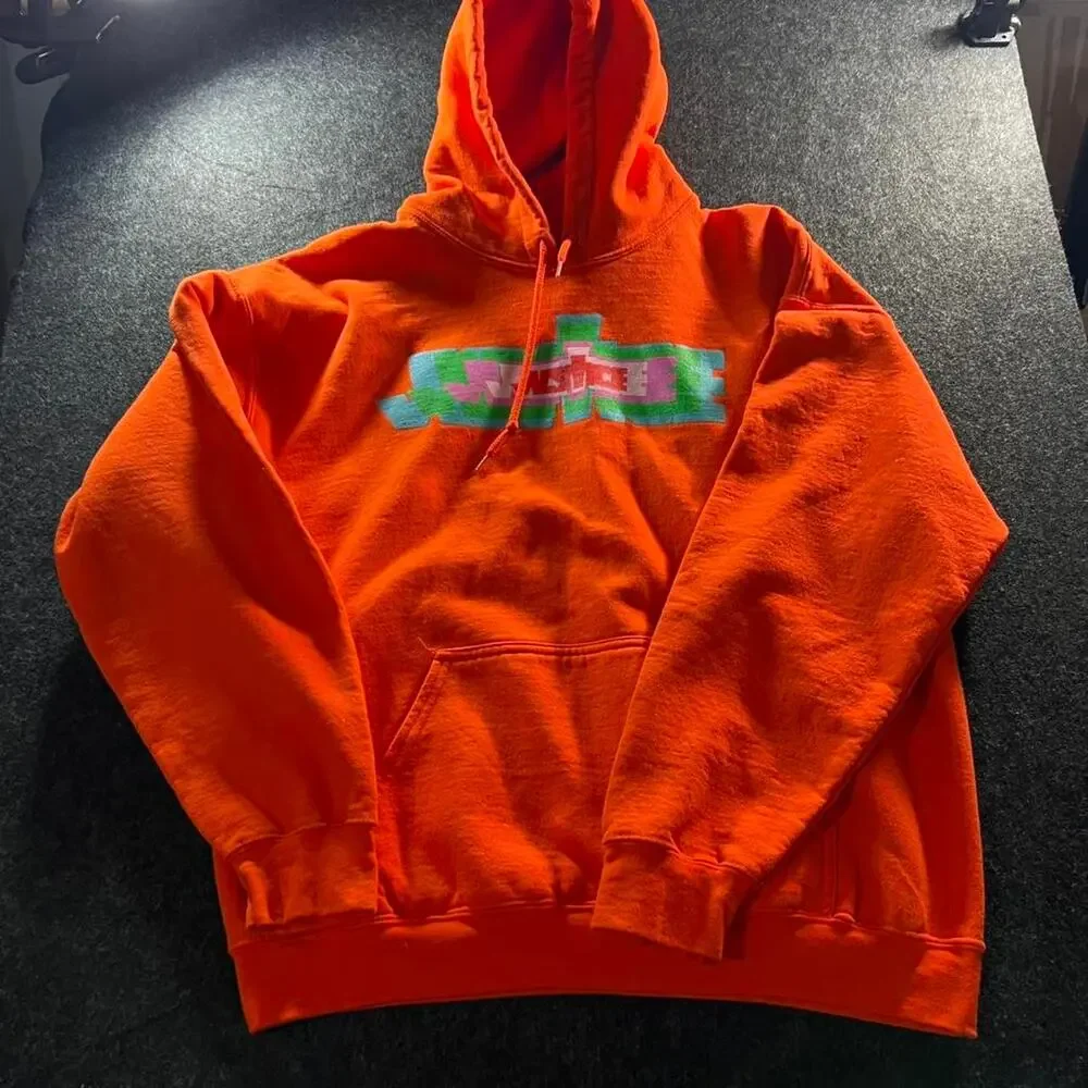 Justice orange hoodie with multicoloured design Size L